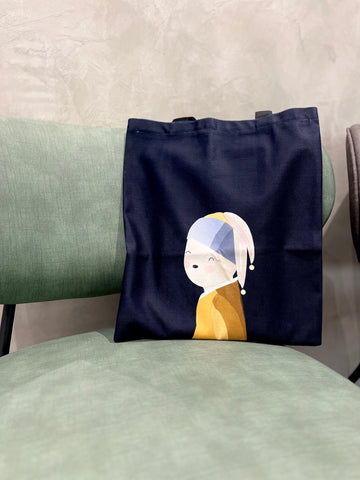 A dark blue cotton tote bag with an illustration of a bunny, imitating the famous painting of 