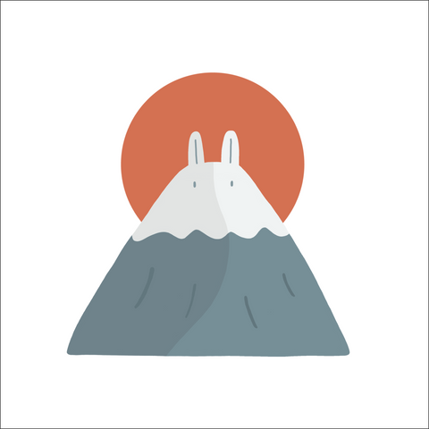 Close up of the illustration on the Fuji Bunny t-shirt, featuring a minimalist design of a Mount Fuji with a pair of bunny ears and a rising orange sun in the background